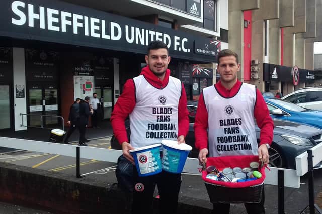Sheffield United first team players John Egan and Billy Sharp supporting the Foodbank collection.