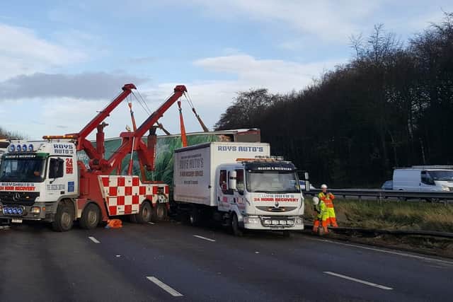 A lorry which overturned on the M1 in South Yorkshire earlier this morning is now upright again