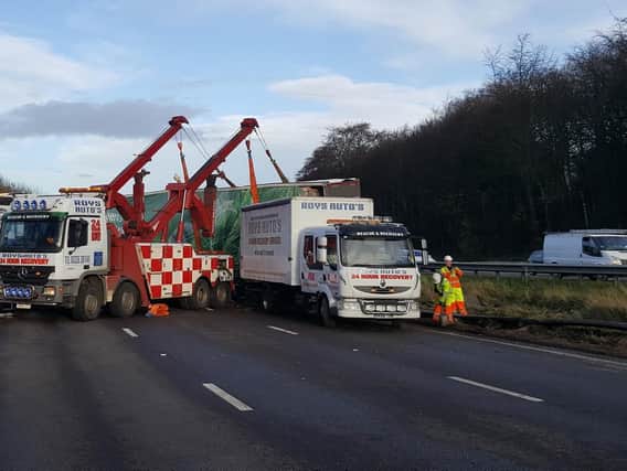 A lorry which overturned on the M1 in South Yorkshire earlier this morning is now upright again