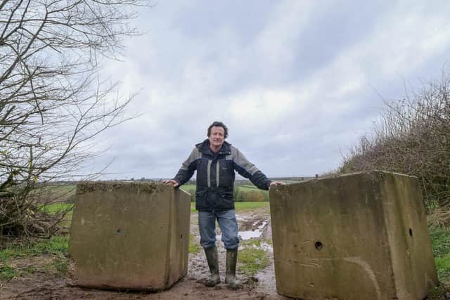 Michael has had to put blocks on the land to deter fly tippers