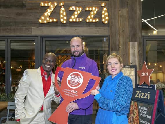 Maxwell Ayamba, who runs Sheffield Environmental Movement to educate children on environmental issues is one of the latest Moor Pride in Sheffield Community Champions. Maxwell with The Moor's Grant Boyle and Zizzi's Lindsay Thornton. Picture: Scott Merrylees
