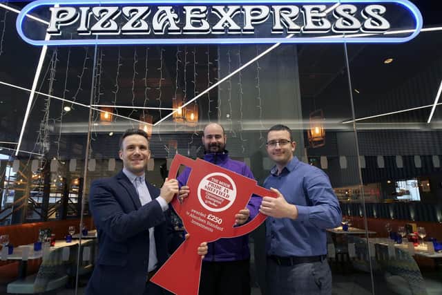 Matt Dean, chief executive of Zest community centre, Woodthorpe is one of the latest Moor Pride in Sheffield Community Champion. Matt with The Moor's Grant Boyle and Rob Clarke from Pizza Express. Picture:Scott Merrylees