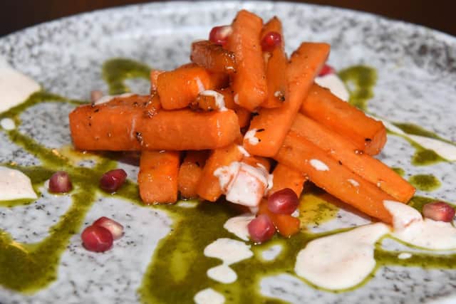 Roasted carrots with chilli, garlic and honey dressed in carrot top pesto and spiced yoghurt at the Bank House, Hathersage.