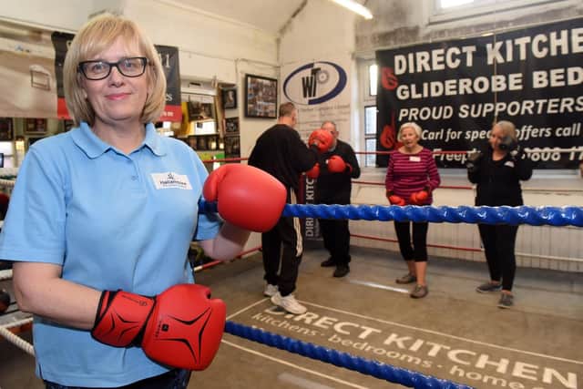 Karen Hodgson runs a boxing session for people with Parkinson's.
