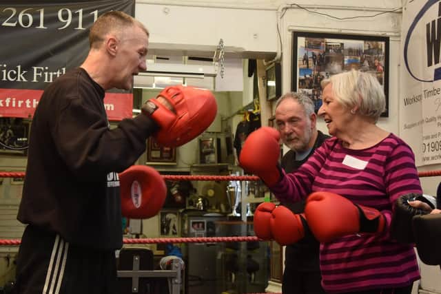 Glyn Rhodes with Avril Broomhead at a boxing session for people with Parkinson's.