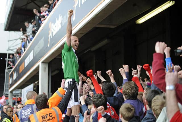 Doncaster Rovers Rob Jones celebrates winning League One at Griffin Park, Brentford. PRESS ASSOCIATION Photo. Picture date: Saturday April 27, 2013. See PA story SOCCER Brentford. Photo credit should read: Sean Dempsey/PA Wire. RESTRICTIONS: Editorial use only. Maximum 45 images during a match. No video emulation or promotion as 'live'. No use in games, competitions, merchandise, betting or single club/player services. No use with unofficial audio, video, data, fixtures or club/league logos.