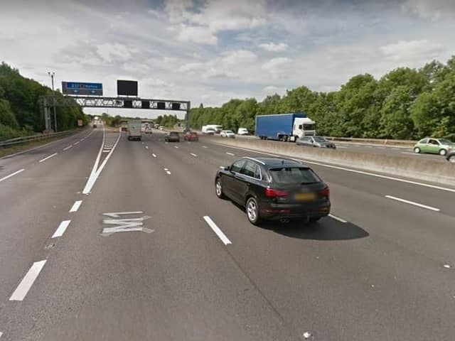 A car crashed into the central reservation barrier on the M1, near Sheffield, this morning