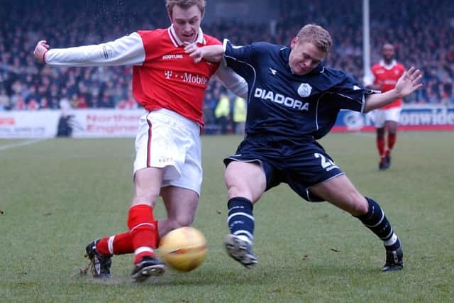 Rotherham v Sheffield Wednesday. 
Rotherham player Chris Sedgwick battles for the ball with Wednesday player Derek Geary . 1st January 2003