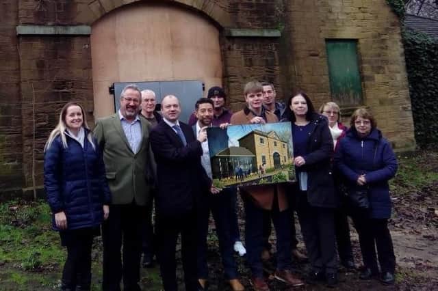 Representatives from Sheffield City Council, Age UK Sheffield and Friends of Hillsborough Park outside the old coach house in Hillsborough Park