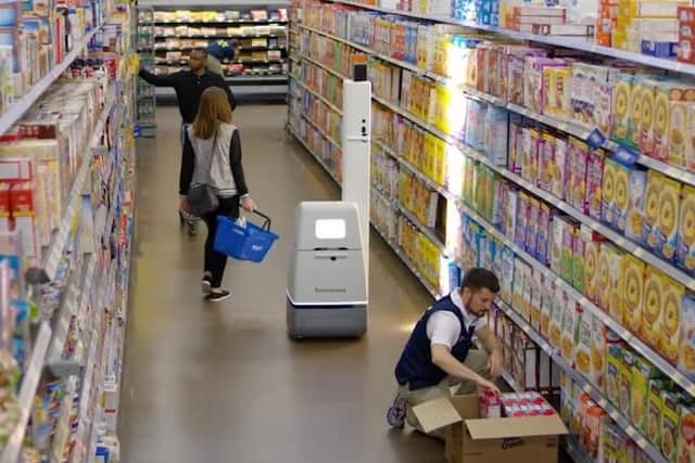 Bossanova robot scanning shelves.