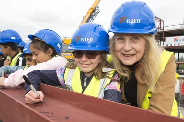 Steel signing at the new Astrea Academy being built on the site of the former Pye Bank infant School
Sarah Jane Sykes signs her name on the last steel with Cllr Jackie Drayton