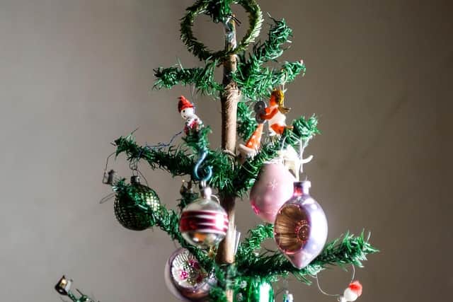 Ornaments and trinkets hung on the 98 year old Christmas tree owned by Kaye Ashton. Picture: Dan Rowlands/SWNS.com