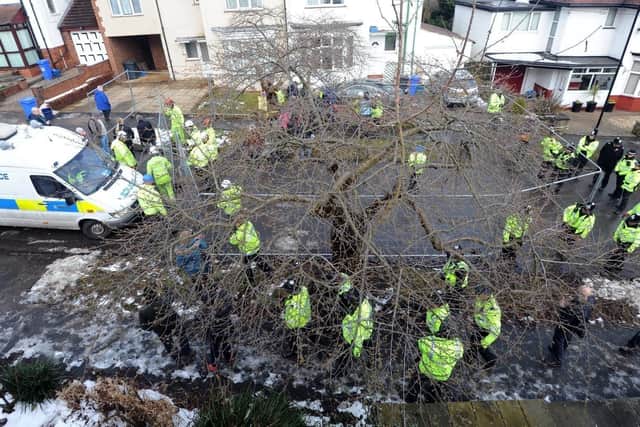 Police at one of Sheffield's tree felling sites.