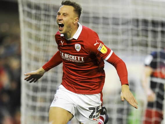 Barnsley v Doncaster Rovers
Skybet League One
Barnsley's Cauley Woodrow  firing the equaliser at Oakwell