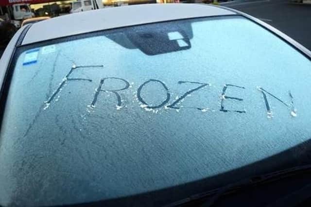 Two cars were stolen this morning while they were defrosting