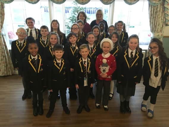 Children from Lowedges Junior Academy visited Lower Bowshaw Residents Home to perform Christmas carols
