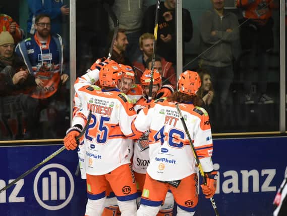 Steelers celebrate a goal, at Guildford