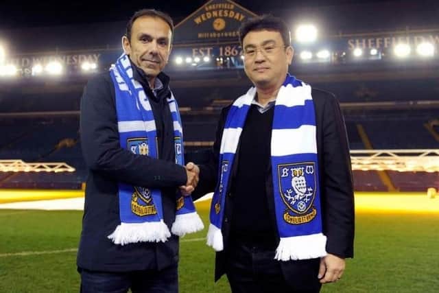 Jos Luhukay with Owls owner Dejphon Chansiri after his appointment