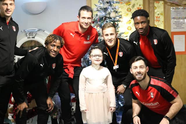 Rotherham United's Will Vaulks, pictured centre, with Millers players and youngsters at Bluebell Wood Children's Hospice