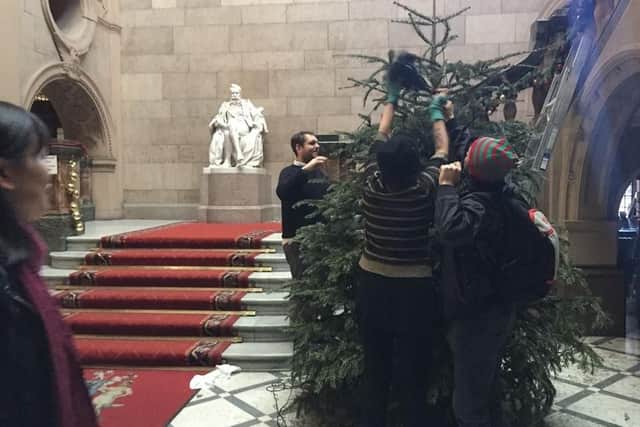 The tree is taken down in the Town Hall.