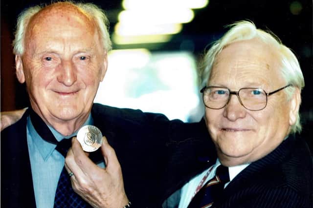 Eric Kirby, pictured right, supported Sheffield Wednesday all his life