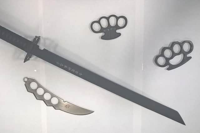 Knuckledusters and a samurai sword found at a property inn Sheffield.