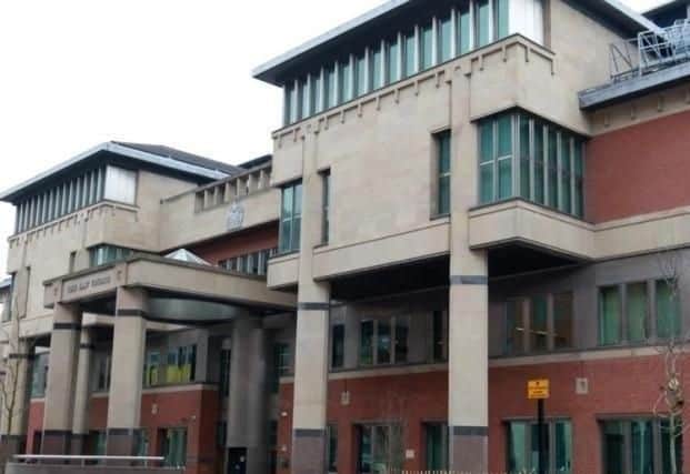 A man accused of two robberies is due at Sheffield Crown Court next month
