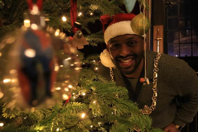 The Lord Mayor of Sheffield Magid Magid asked the people of Sheffield to help him decorate the Christmas Tree in the Lord Mayor's Parlour at the Town Hall. Pictured is Lord Mayor of Sheffield Magid Magid. Picture: Chris Etchells