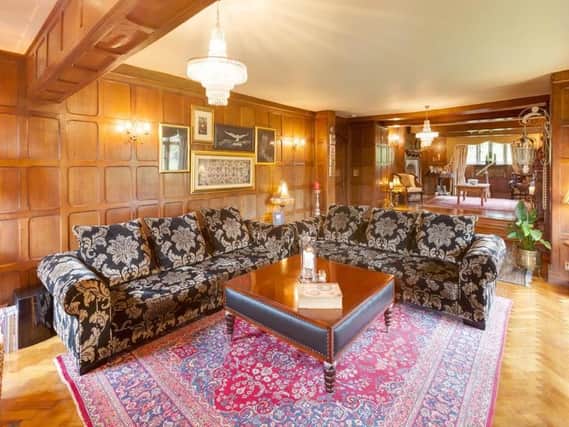 The luxurious wood-panelled lounge of Sugworth Hall, a six bed property at Bradfield Dale on the market for offers in the region of up to 1,650,000 through Blenheim Park Estates on 0114 446 9290.
