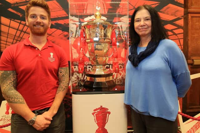 The Rugby League World Cup went on show at Sheffield Town Hall. Pictured is player James Simpson and Coun Mary Lea.