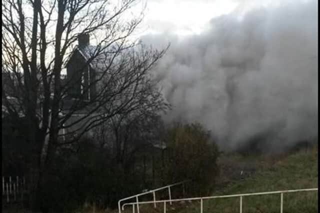 Smoke billowing from the fire at an abandoned building on Lamb Lane, in Monk Bretton, Barnsley