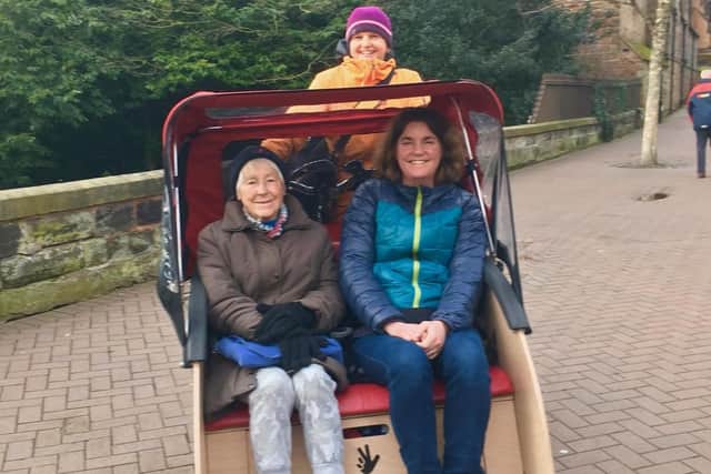 Clare and her aunt Margaret during a trial ride in a trishaw (Picture: Claire Rawlings)
