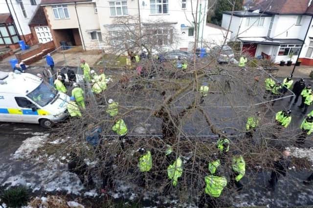 Police at a protest against the felling of street trees in Sheffield