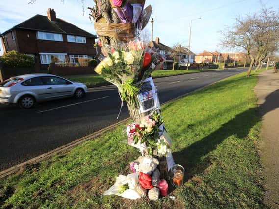 Flowers at the scene of a fatal crash on Broadway in Barnsley.