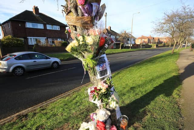 Flowers at the scene of a fatal crash on Broadway in Barnsley.