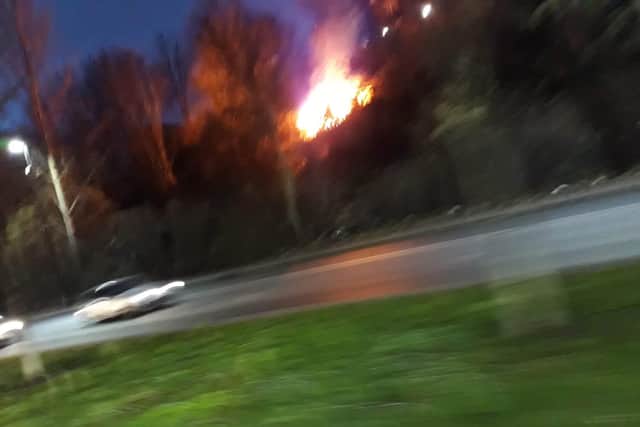 Flames could be seen at the side of Penistone Road earlier this morning