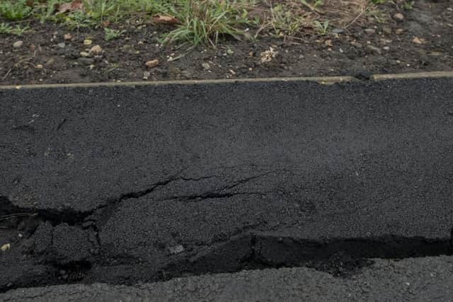 Cracks in the road. Picture: Scott Merrylees