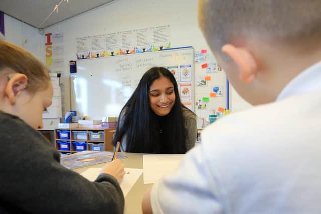 Primary school pupils from Arbourthorne Primary School are being taught Latin to help improve literacy standards. The initiative is being supported by Classics teachers from Sheffield High School for Girls. Pictured in one of the lessons is Sneha Shiralagi from Sheffield High School for Girls. Picture: Chris Etchells