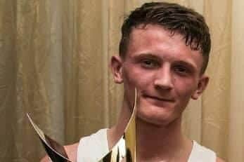 Tom Bell, pictured holding the Ken Blood trophy. The award, named after Doncaster Plant Works Amateur Boxing Club's former coach, is handed to the gym's boxer of the year. Picture: Doncaster Plant Works ABC