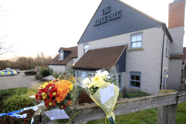 Floral tributes at the Maple Tree Pub in Balby. Picture: Chris Etchells.