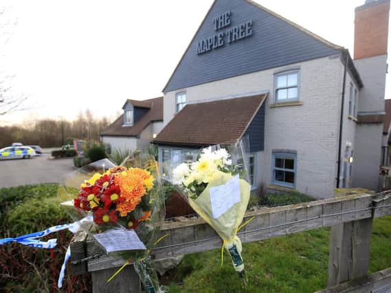 Floral tributes at the  Maple Tree Pub in Balby. Picture: Chris Etchells.