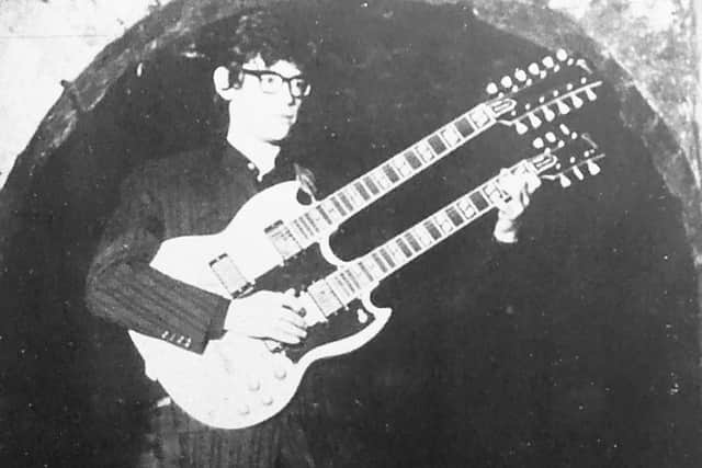 Frank White with the distinctive, double neck Gibson at Sheffield's Club 60 in the 1960s.