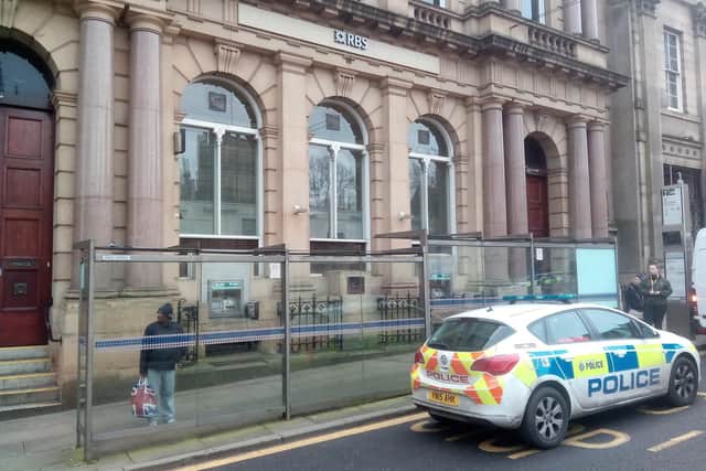 Police outside the RBS bank, High Street. Picture: Sam Cooper / The Star.