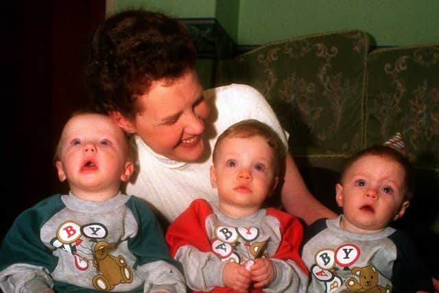 Charlie, Joe and Lewis celebrating their first birthday with their mum Gillian