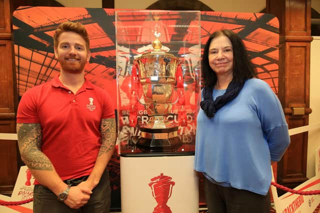 James Simpson and Coun Mary Lea, pictured with the Rugby League World Cup trophy, which went on show at Sheffield Town Hall last year.