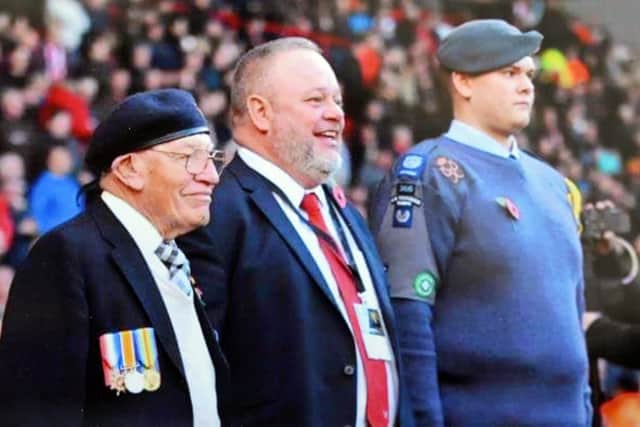 Roy, pictured with John Garrett and an Air Force cadet. Picture: NSST-28-01-19-Ashton-12