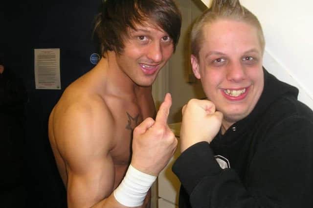 Adam pictured with Kris Travis the first time they met