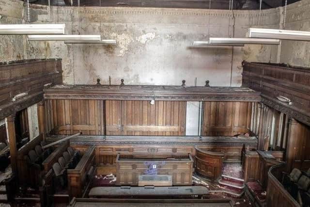 How one of the former court rooms at Sheffield's Old Town Hall looks following years of decay