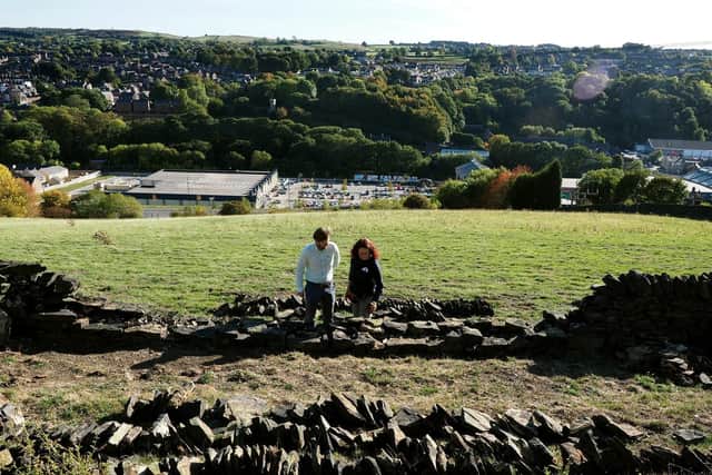 Tom Newman and Kate Hughes, of the Steel Valley Project pictured on land above Stocksbridge. Picture: David Bocking.