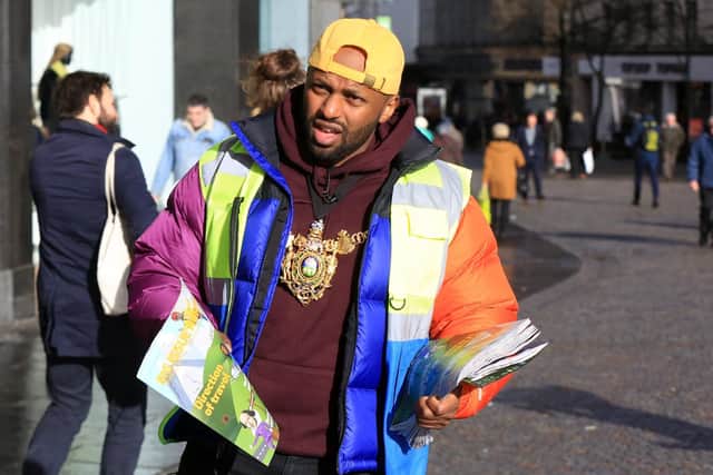 Lord Mayor Magid Magid, selling Big Issue North. Picture: Chris Etchells